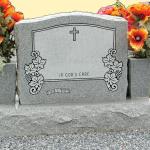 Single Upright Gray Granite -- Serpentine Top -- Sawed Finish -- Matching Base -- Flower and Cross Design Additions